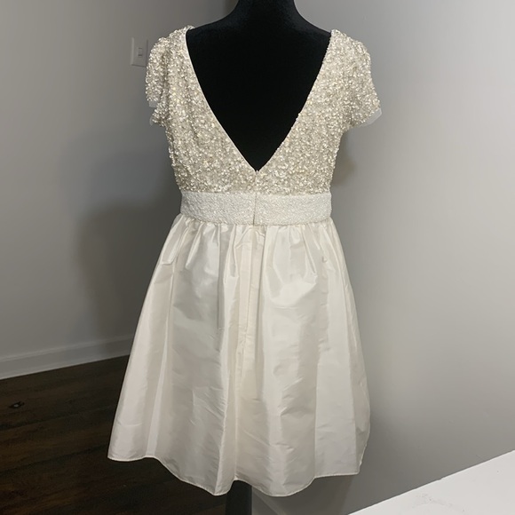 White baby doll dress with sequins at the top and beading along the waistband - Picture 3 of 4